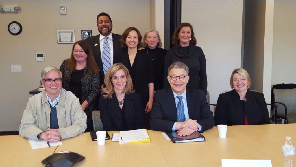 Pictured left to right: Jennifer Ho – Senior Advisor for Housing and Health Care HUD, Erin Sutton Sullivan – Division Director MN DHS, George Stone – Director CSH, Jennifer Decubellis – Hennepin County Deputy Administrator, Cathy ten Broeke –State Director to Prevent and End Homelessness, Commissioner Mary Tingerthal – MN Housing, US Senator Al Franken, Amy Ward – Director of Helath Initiatives, Wilder Foundation, Martha Lantz –ED Touchstone Mental Health