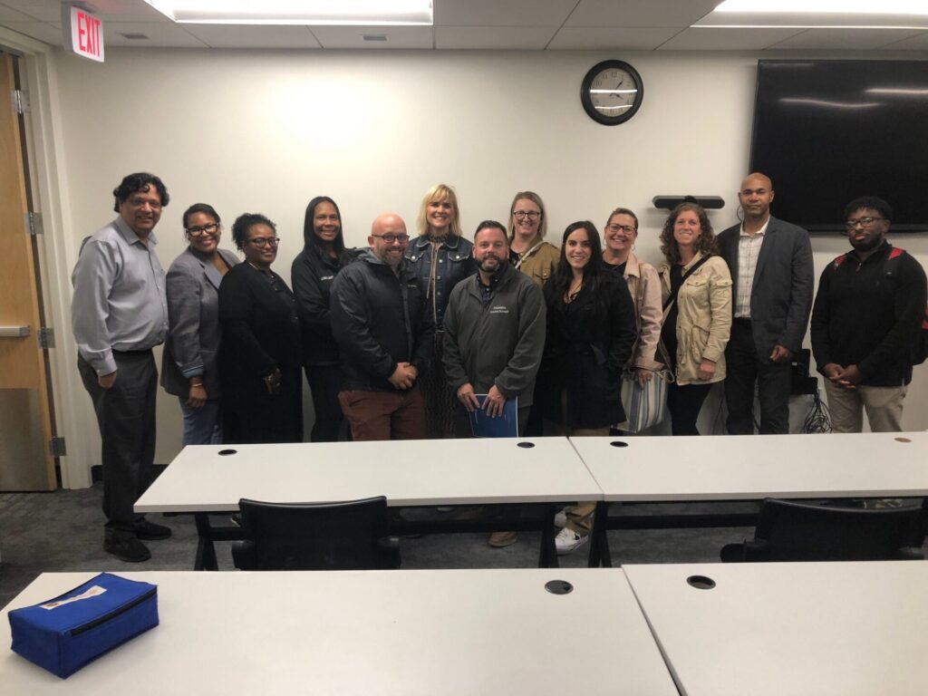 CSH team members with representatives from Detroit and Michigan standing in a group